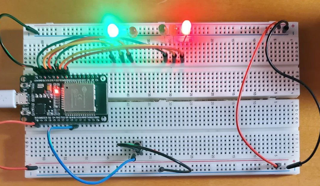 Original coursework photograph of the ESP32 traffic-light circuit
